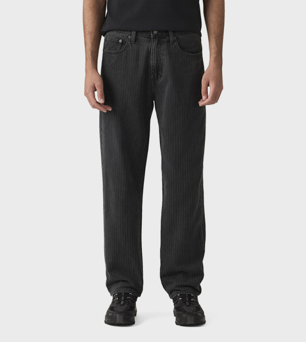 568™ Textured Mid Rise Relaxed Fit Jeans