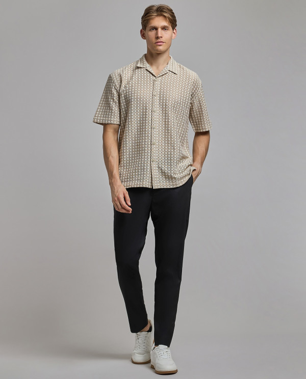 Solid Tapered Fit Trousers with Button Closure