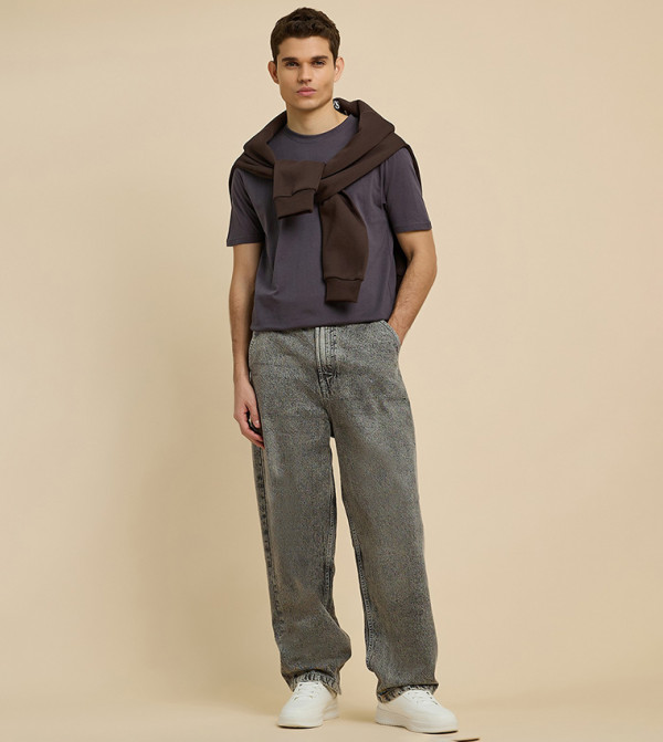 Washed Skater Jeans with Button Closure