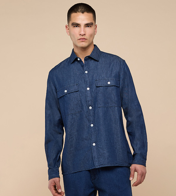 قميص دنيم مغسول كم طويل