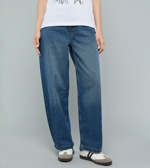 Faded Barrel Jeans with Button Closure