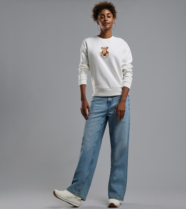 Faded Baggy Jeans with Button Closure