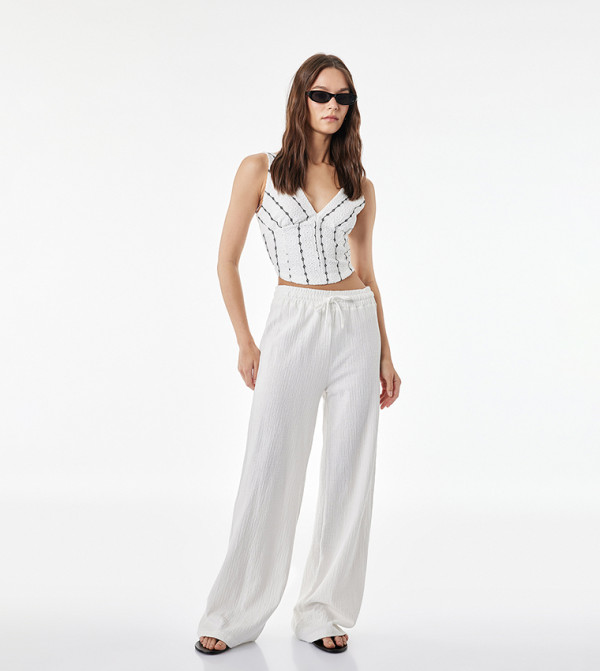 Embroidered V-Neck Tie-Back Sleeveless Crop Top