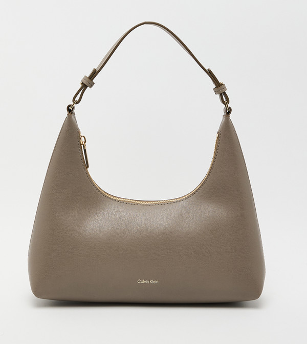 شنطة كتف بنقشة وشعار 