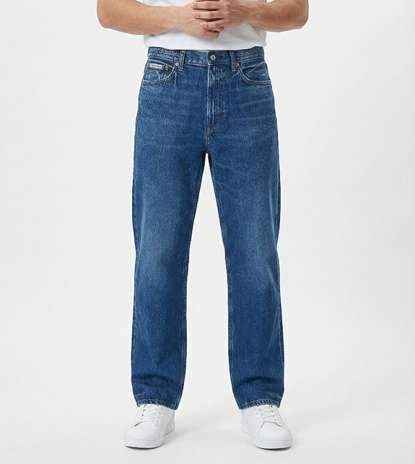 بنطلون جينز واسع مغسول بخصر متوسط 