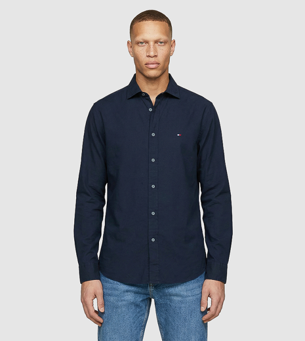 قميص بكم طويل بتفصيل شعار