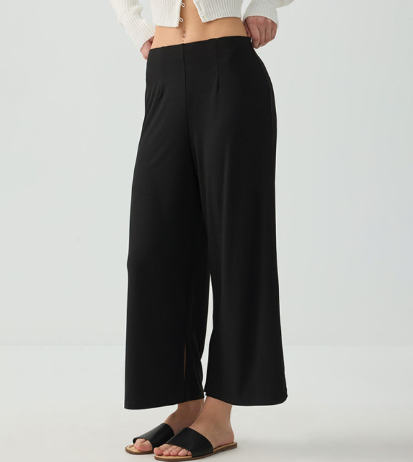 بنطلون واسع سادة بفتحات جانبية