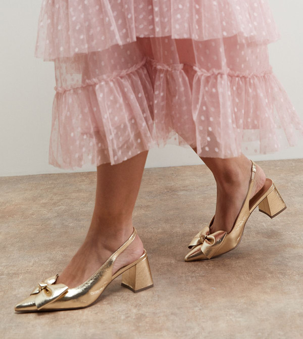 Seala Metallic Faux Leather Bow Slingback Pumps