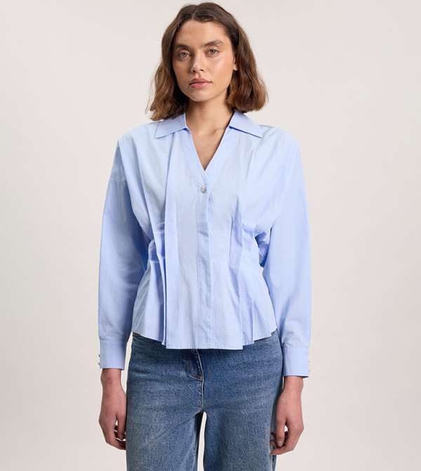 قميص بكم طويل وكسرات 