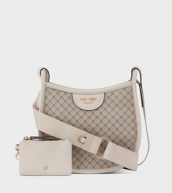 شنطة كروس بودي نسائية بنقشة مونوغرام 