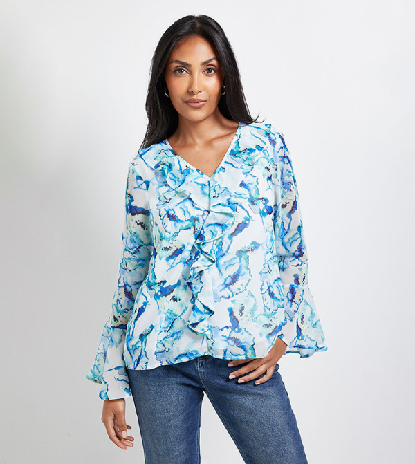 توب بطبعة ورود بكشكش للمقاسات الصغيرة