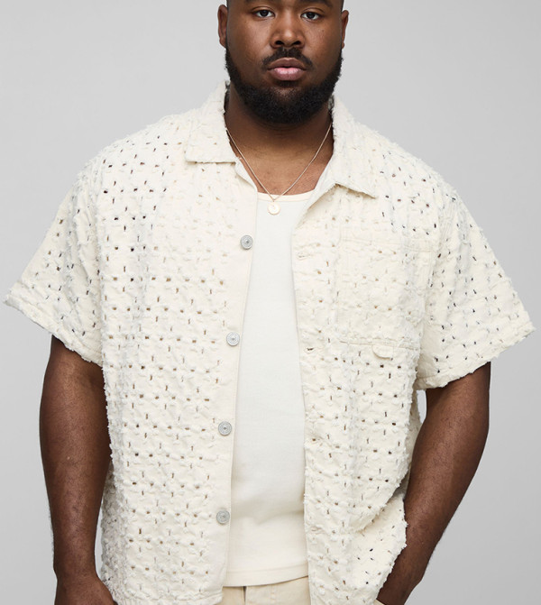 قميص واسع ممزق بأكمام قصيرة 