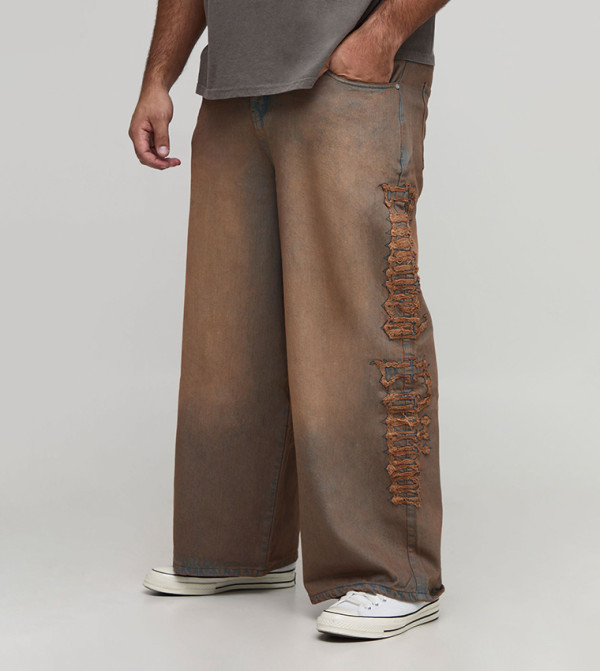 Washed Raw Applique Baggy Fit Jeans