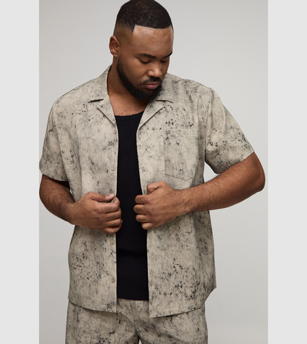 قميص مغسول كم قصير 