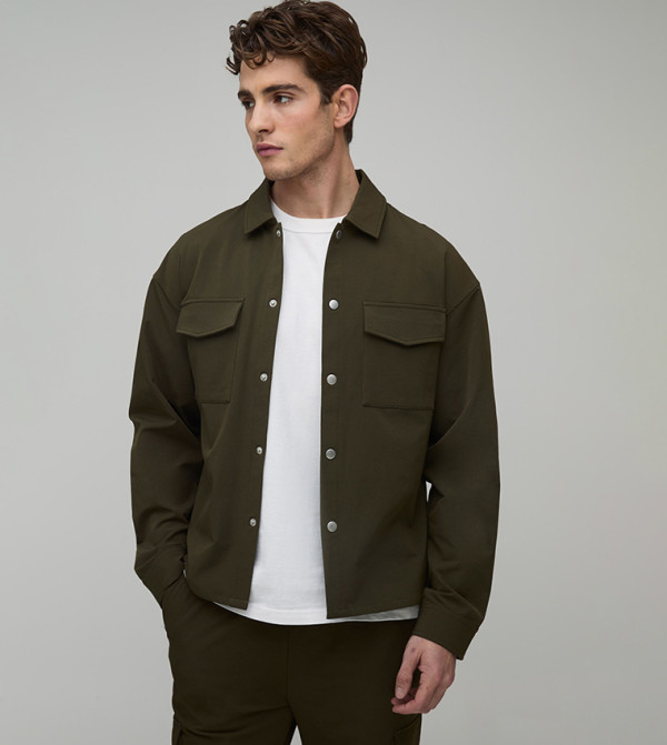 قميص كم طويل بأزرار