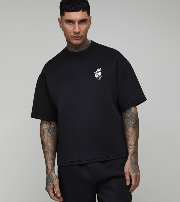 تيشيرت أوفرسايز بطبعة زهور للمقاسات الطويلة