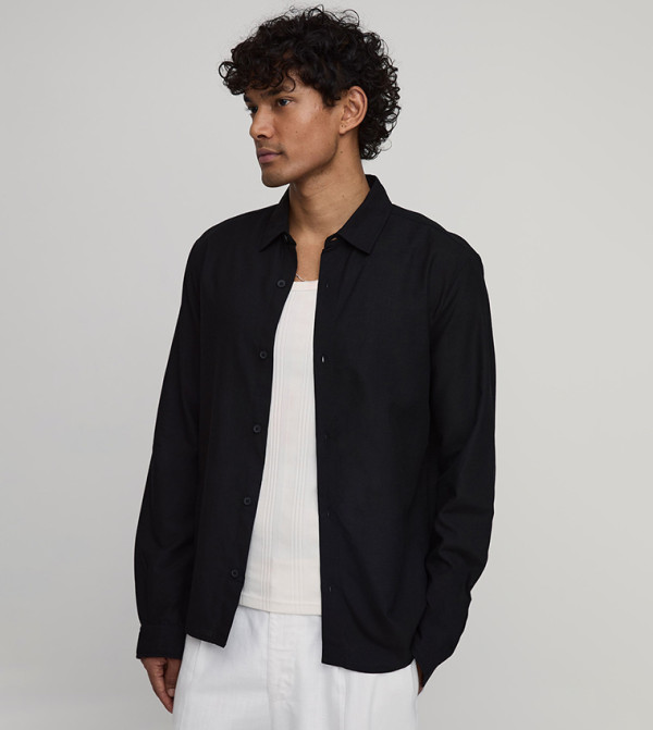 قميص لينن كم طويل بقصة عادية