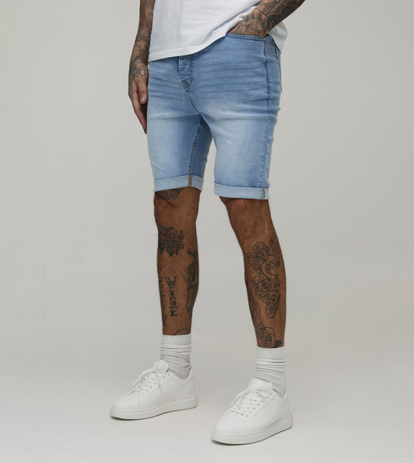 شورت جينز ضيق مطاطي للمقاسات الطويلة