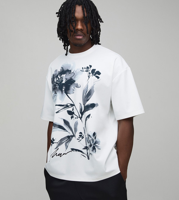 تيشيرت أوفرسايز بطبعة زهور للمقاسات الطويلة