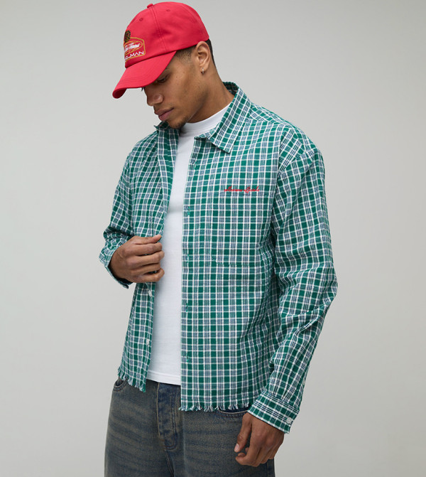 قميص اوفرسايز كاروهات بحافة خام