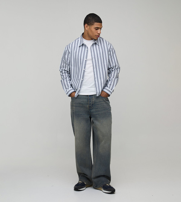 قميص واسع مخطط بكم طويل