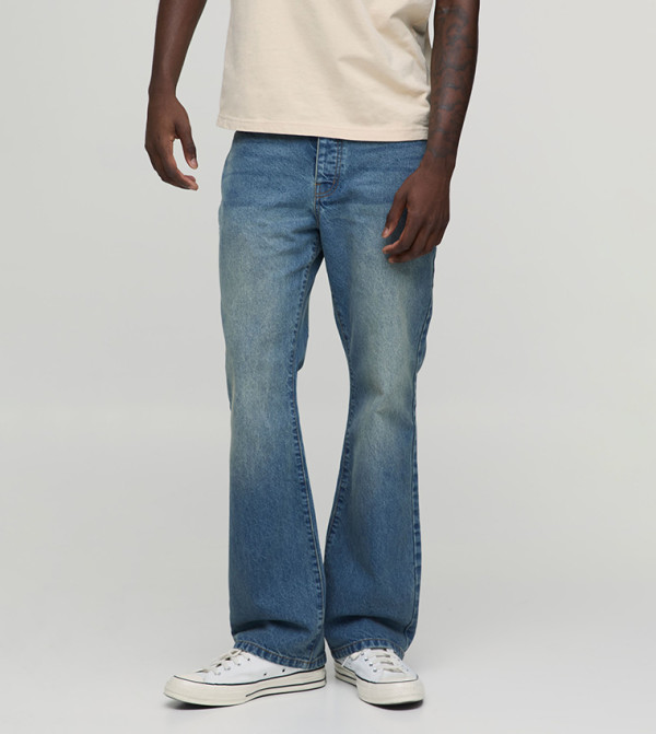 Washed Mid Rise Flared Jeans