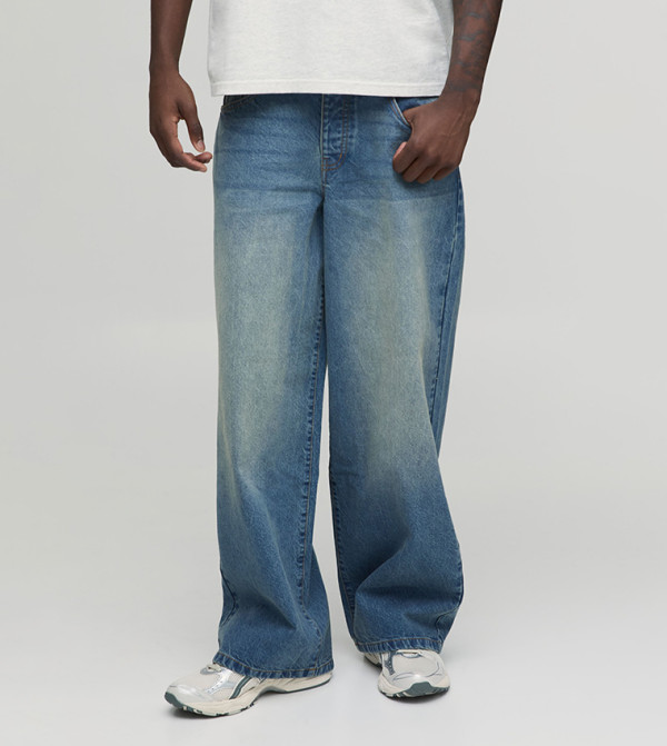 Washed Mid Rise Baggy Fit Jeans