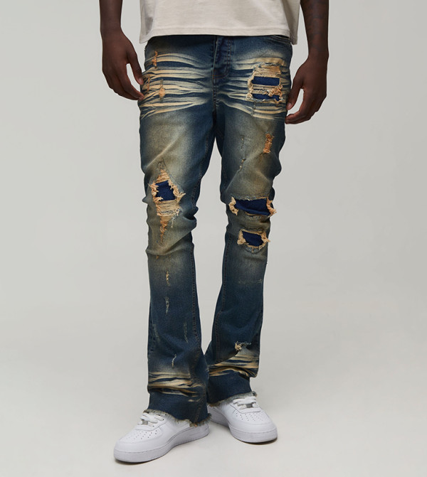 Ripped Stacked Skinny Fit Flared Jeans