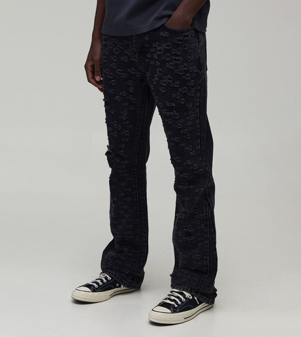 All Over Ripped Stacked Gusset Slim Fit Flared Jeans
