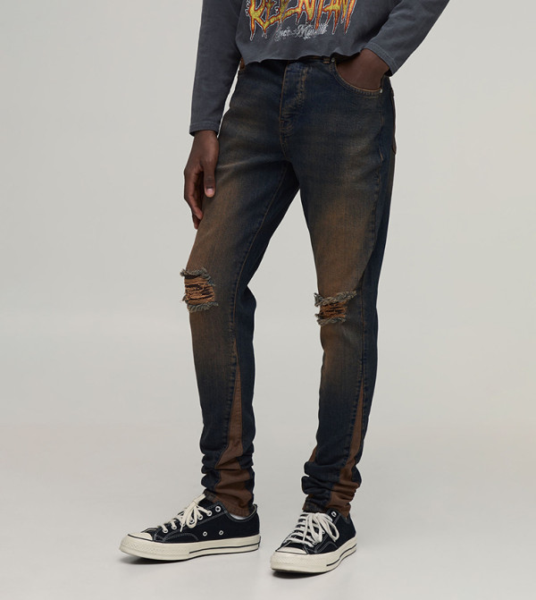 Crease Wash Ripped Gusset Stacked Skinny Jeans