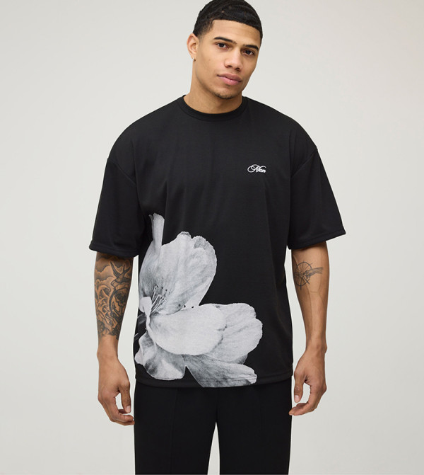 تيشيرت اوفرسايز ثقيل بطبعة ورود