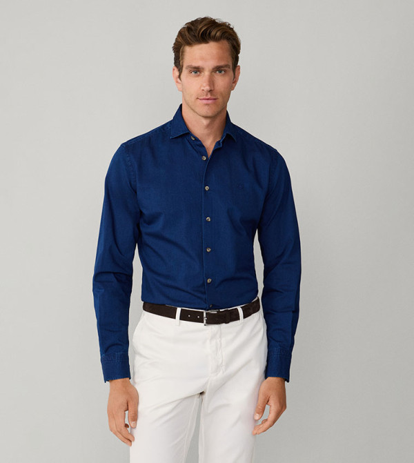 قميص جينز مغسول بقصة مصممة