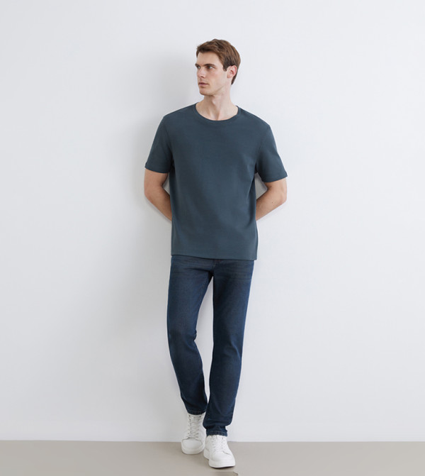 750 Faded Slim Fit Jeans