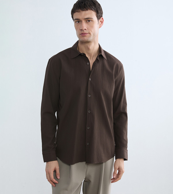 قميص  كم طويل بقصة عادية