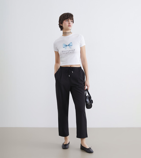 Solid Elastic Waist Carrot Fit Trousers