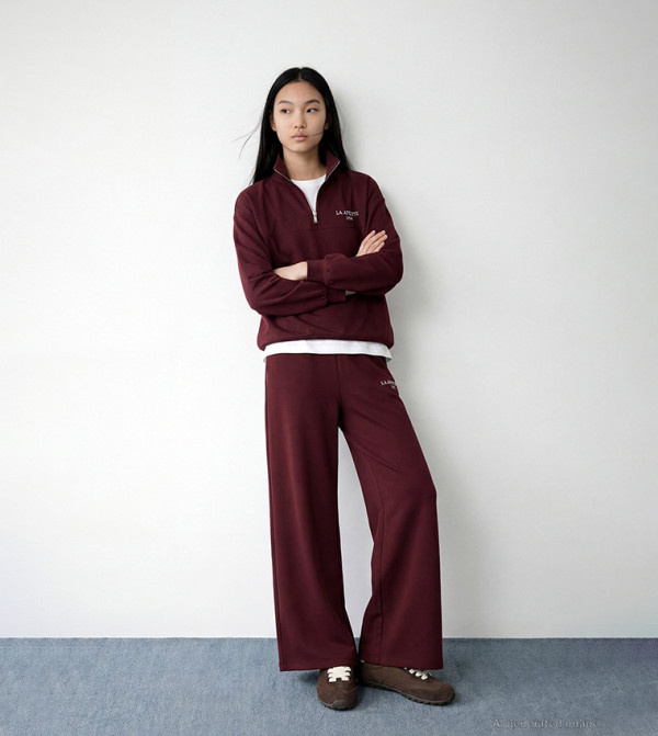 سويتشيرت اوفرسايز مطرز بقبة عالية 