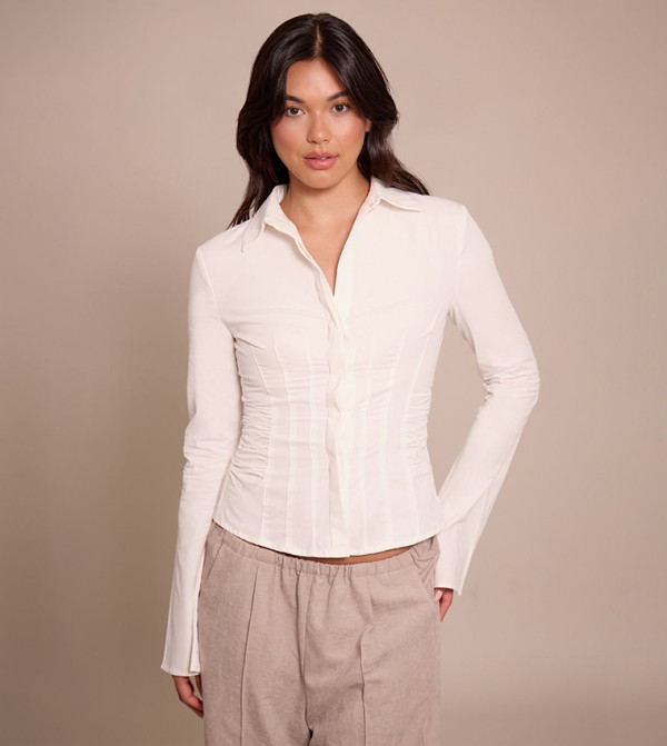 قميص مزموم كم واسع 