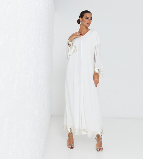 White Laise Design At Bottom And Sleeves