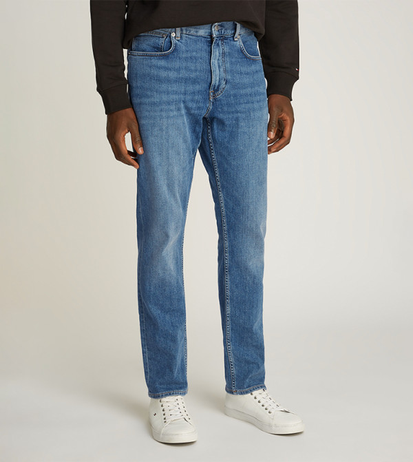 Washed Mid Rise Tapered Fit Jeans
