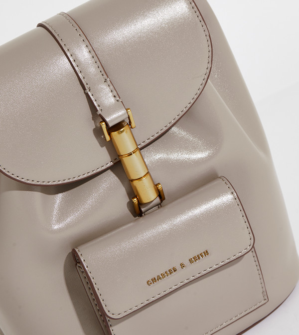 Charles & Keith  Travel Bags - Beige Backpacks