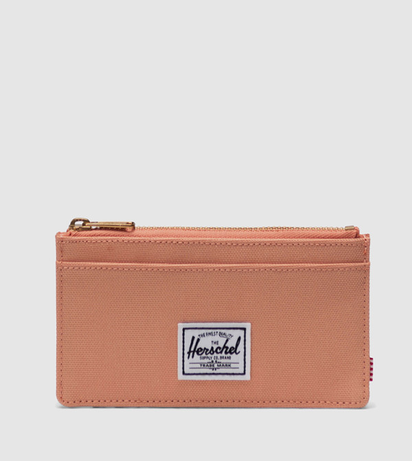 هيرشل  حقائب سفر - لون مرجاني  Travel Wallets