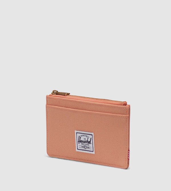 هيرشل  حقائب سفر - لون مرجاني  Travel Wallets