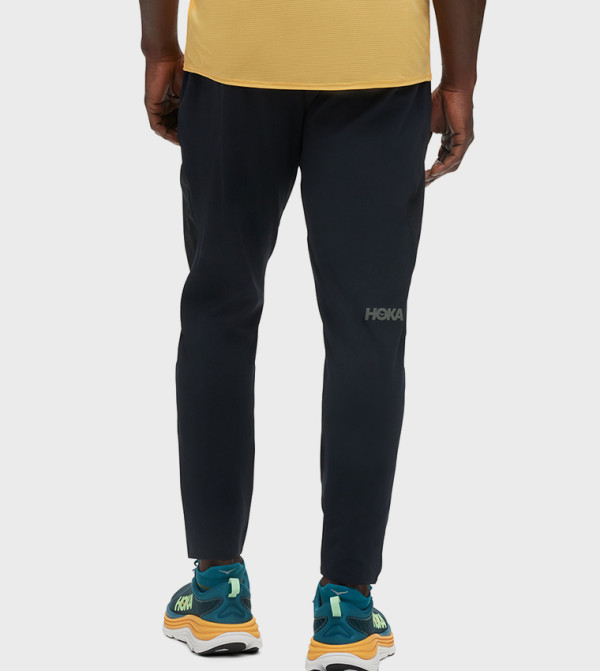 Hoka  Track Pants & Joggers - BLACK Track Pants & Joggers