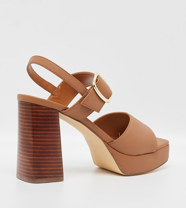 ناين وست صنادل كعب عالي - حنطي كعب