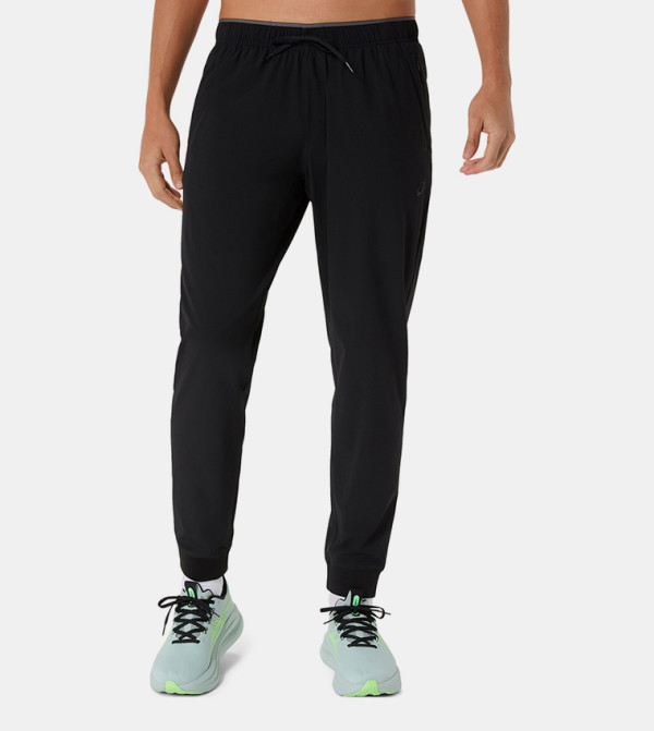 Asics  Track Pants & Joggers - BLACK Track Pants & Joggers