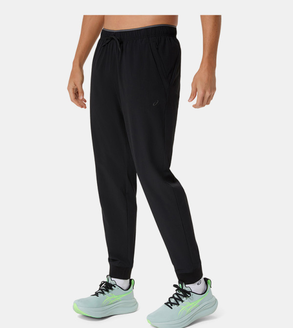 Asics  Track Pants & Joggers - BLACK Track Pants & Joggers