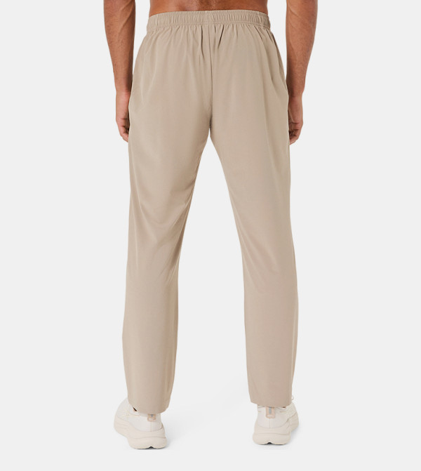 Asics  Track Pants & Joggers - Beige Track Pants & Joggers