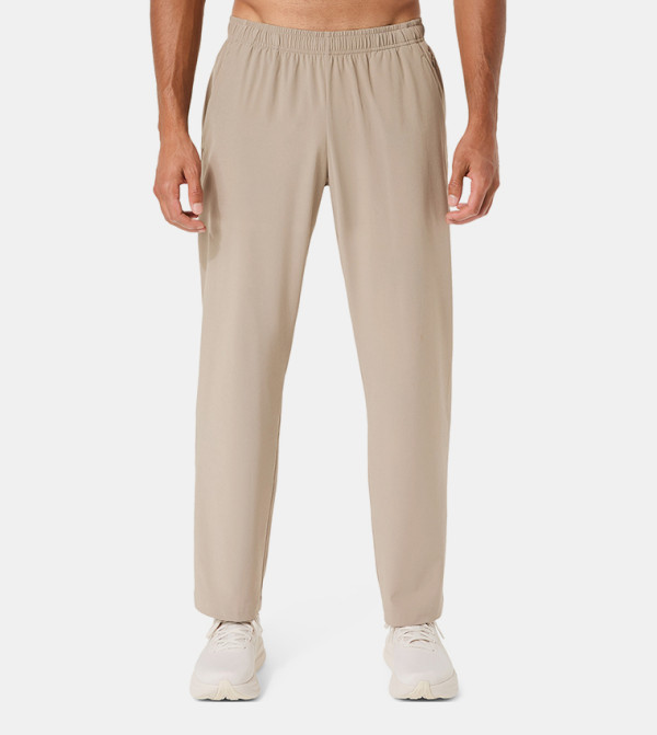 Asics  Track Pants & Joggers - Beige Track Pants & Joggers