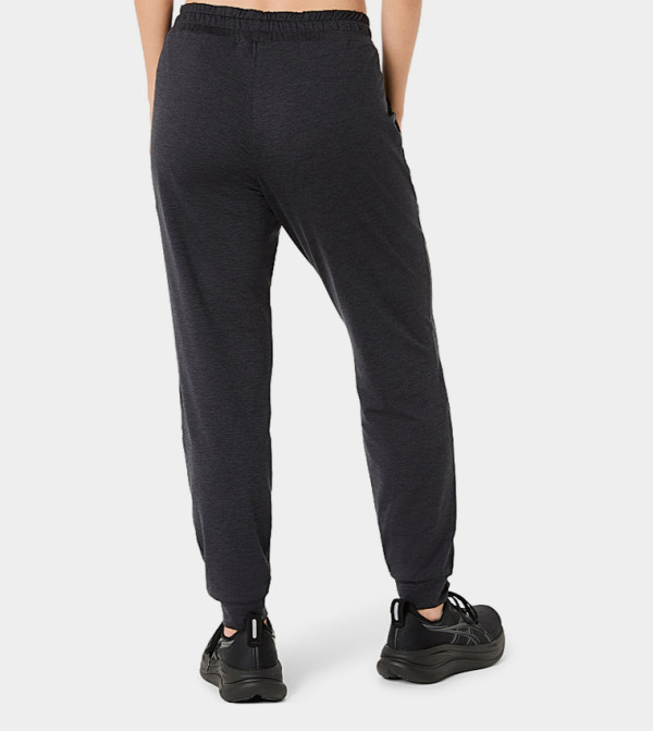 Asics  Track Pants & Joggers - BLACK Track Pants & Joggers