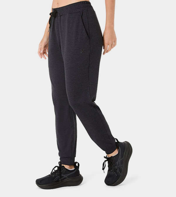 Asics  Track Pants & Joggers - BLACK Track Pants & Joggers